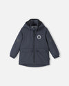 Chaqueta de entretiempo Reima Symppis ReimaTec para niños, color negro suave – Foto del producto (parte delantera)
