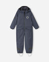 Mono de entretiempo Reima Sevetti ReimaTec para niños, color negro suave – Foto del producto (parte delantera)