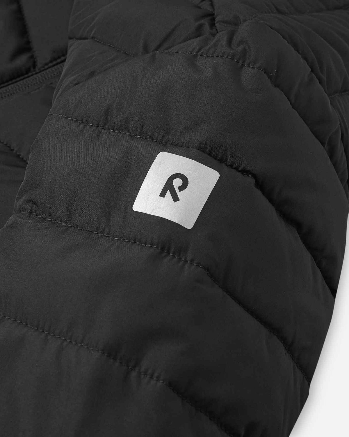 Giacca leggera isolante Reima Uumaja per bambini, nera – Dettagli riflettenti