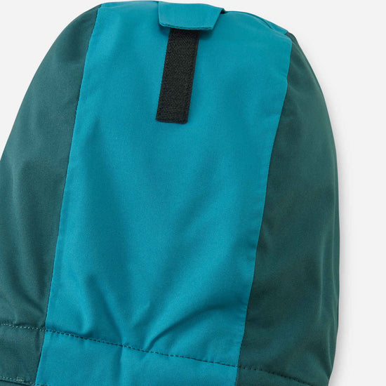 Combinaison de ski Reima Skaulo ReimaTec pour enfants, couleur Dark Teal – Détail au niveau des genoux