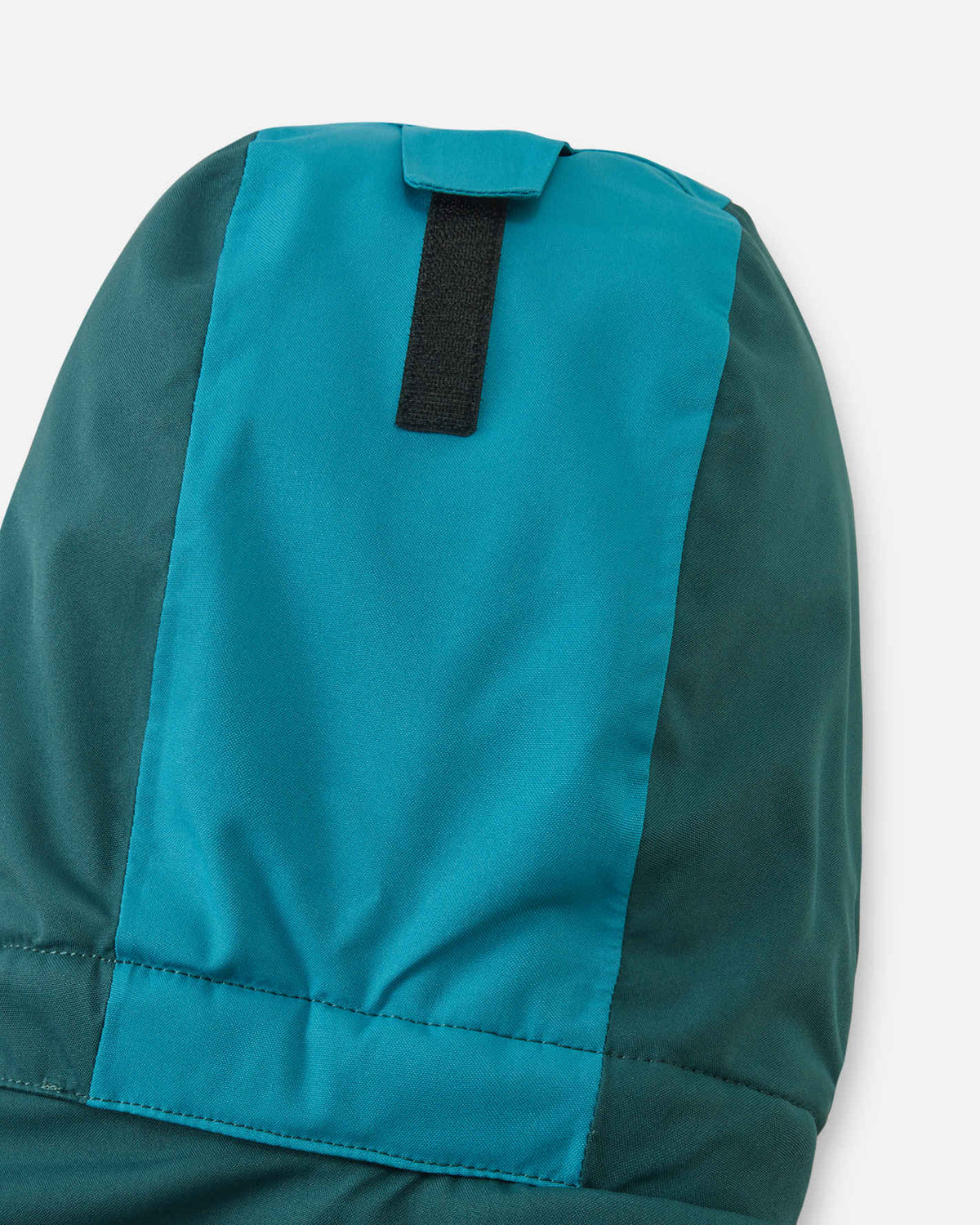 Combinaison de ski Reima Skaulo ReimaTec pour enfants, couleur Dark Teal – Détail au niveau des genoux