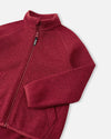 Veste polaire Reima Hopper pour enfants, couleur Cranberry : vue détaillée du col et des manches