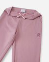 Pantaloni da jogging in pile Reima Nasta per bambini, grigio e rosa – Dettagli prodotto