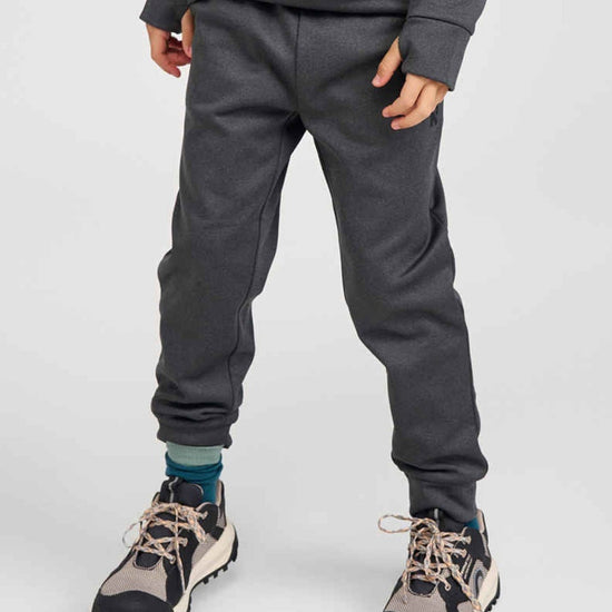 Pantaloni da jogging in pile Reima Nasta per bambini, colore Graphite Melange – Foto in studio