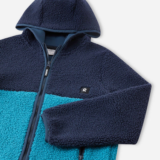 Giacca in pile Teddy Reima Muhkea per bambini, blu navy – Dettagli prodotto