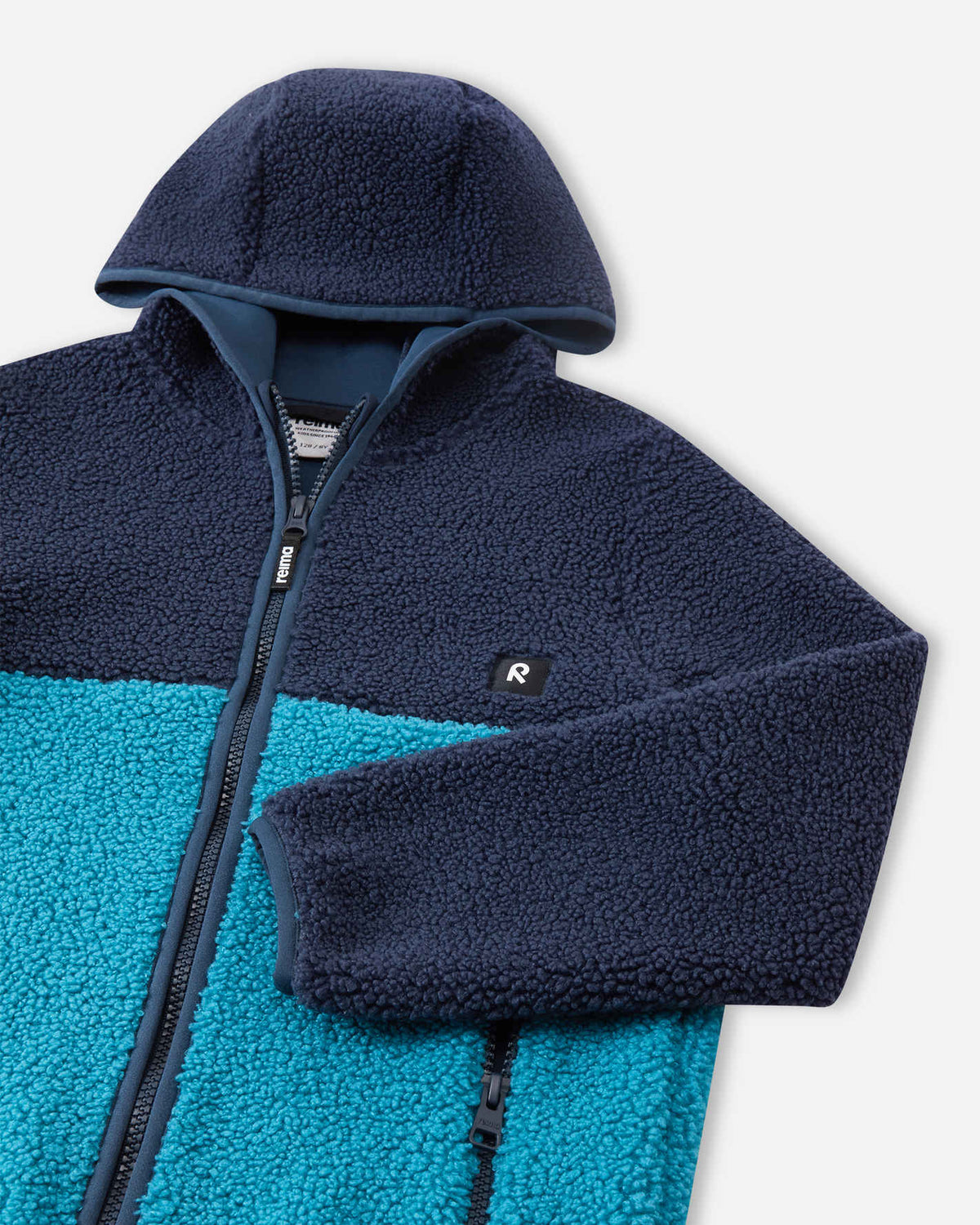 Giacca in pile Teddy Reima Muhkea per bambini, blu navy – Dettagli prodotto