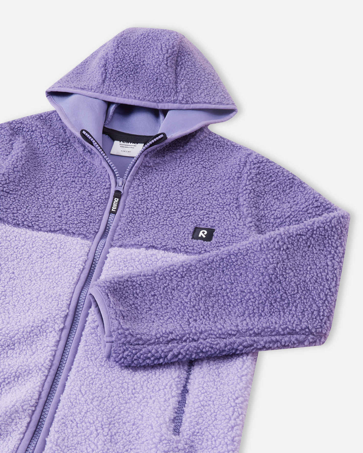 Chaqueta de felpa Reima Muhkea para niños, color Misty Violet – Detalles del producto