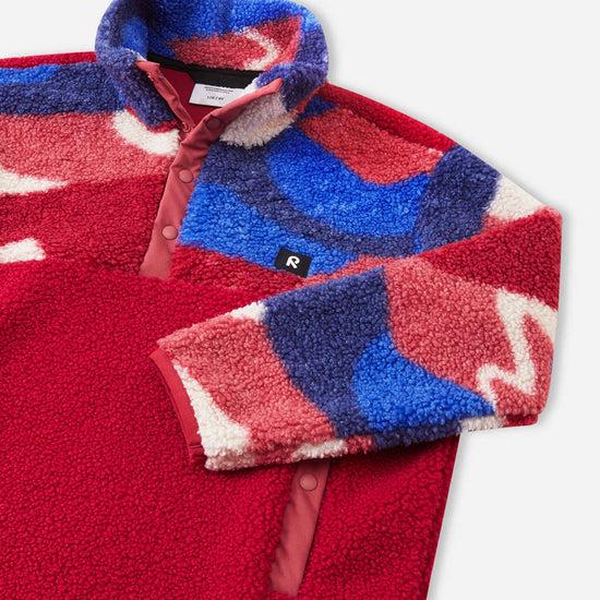 Reima Muhku Cranberry – Detalle del tejido 1